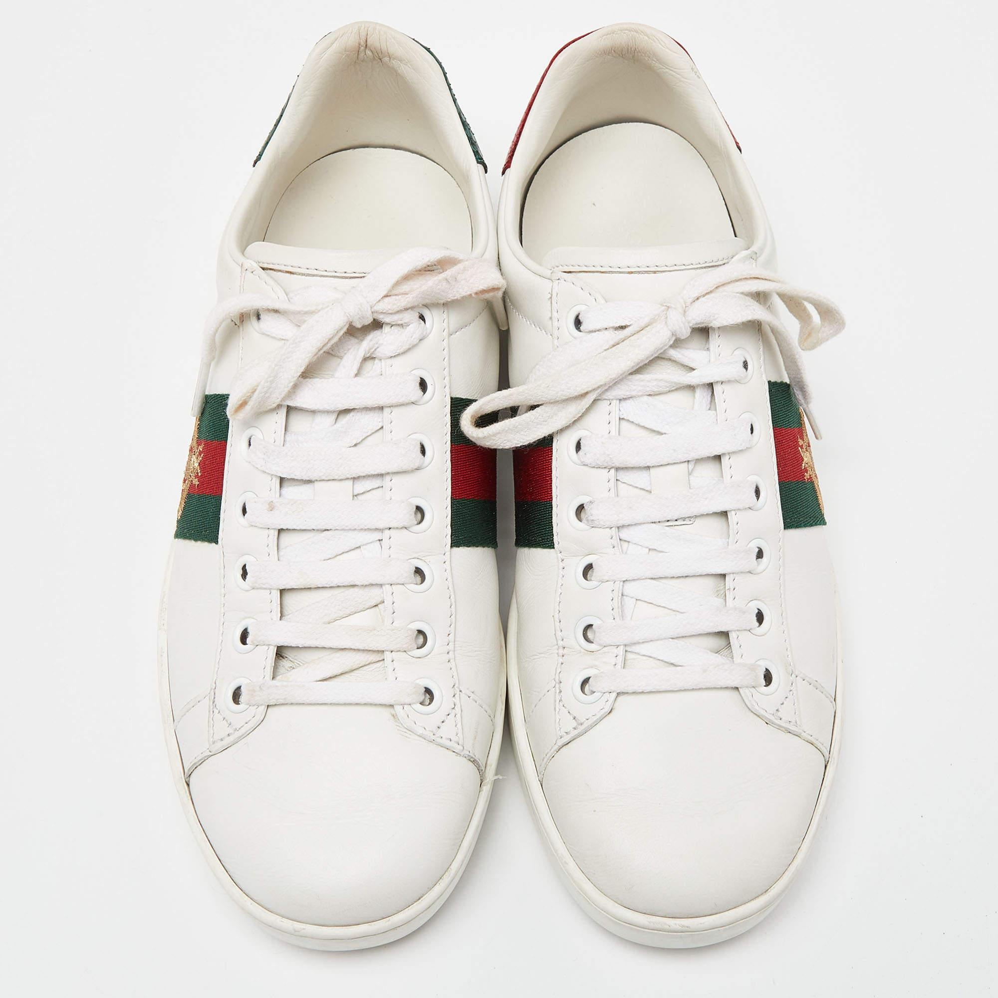 Coming in a classic silhouette, these Gucci white Ace sneakers are a seamless combination of luxury, comfort, and style. These sneakers are designed with signature details and comfortable insoles.

Includes: Original Dustbag, Original Box, Info