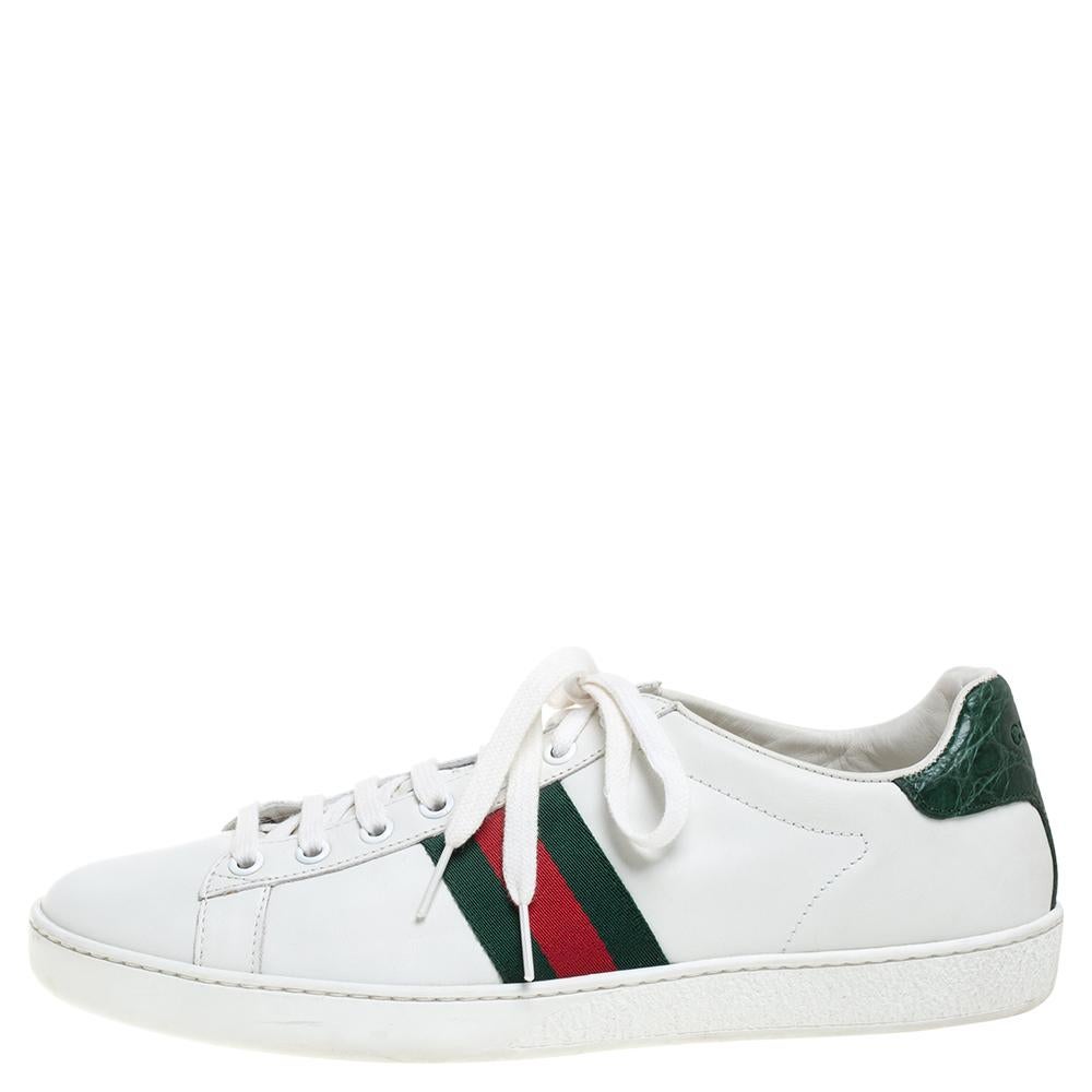 Instantly recognizable and super stylish, these Ace sneakers by Gucci gives the classic white low-top style a fashionable update. Accentuated at the sides with green and red Web panels – a signature emblem for the Italian house. These sneakers are