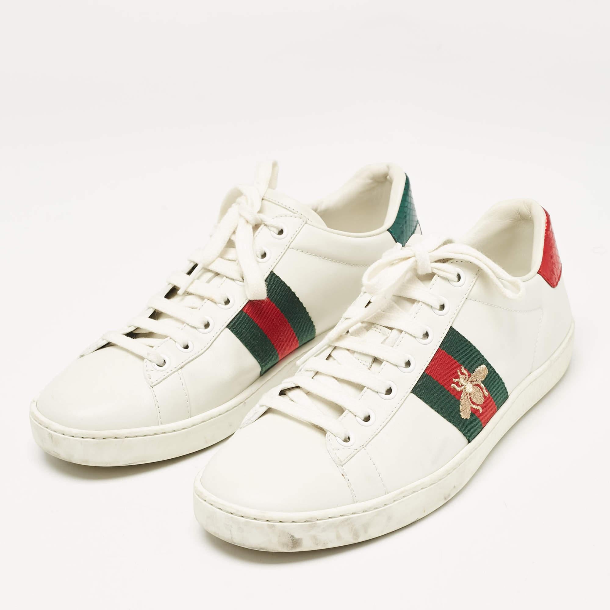 Packed with style and comfort  these Gucci sneakers are gentle on the feet so that you can glide through the day. They have a sleek upper with lace closure  and theyre set on durable rubber soles.