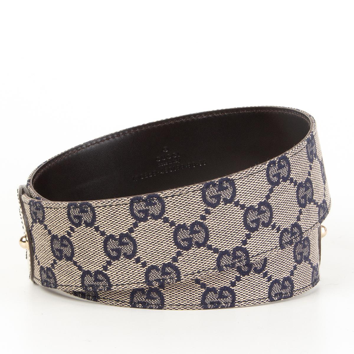 Gucci monogram belt in navy and off-white canvas with off-white leather trim and light gold-tone buckle. Has been worn and is in excellent condition. 

Tag Size 90
Width 4cm (1.6in)
Fits 84cm (32.8in) to 89cm (34.7in)
Length 96cm (37.4in)
Buckle