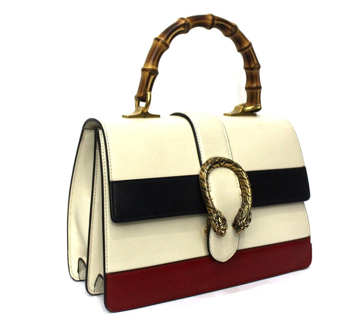 Fabulous Gucci Dionysus line bag made in white, red and blue leather with web strap and bamboo top handle.

Closure with slider, internally quite large.

The bag is in excellent condition.