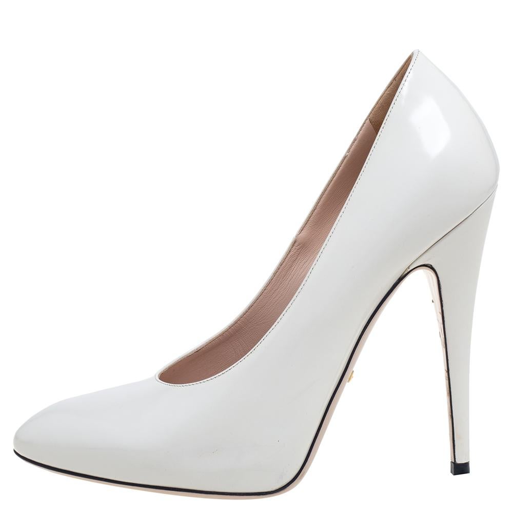 Stand tall and in style with this pair of pumps from Gucci. Crafted from white leather, the Elaisa pumps feature covered toes, durable soles, and 12.5 cm heels. Style the pair with dresses, suits, or chic casuals.

