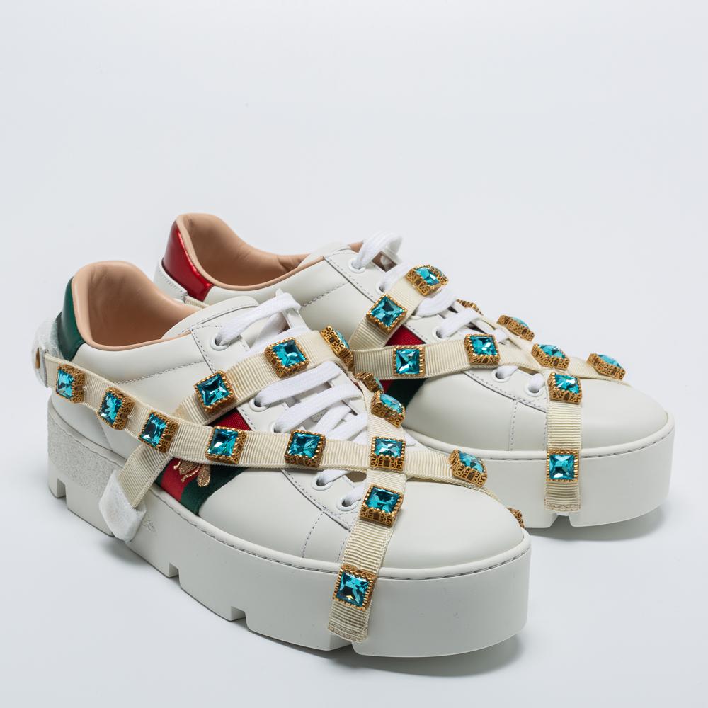 These Flashtrek sneakers by Gucci are the ultimate step-up to bring style and attitude to your look. They are crafted from a combination of quality materials and set on eye-catching, chunky soles. They have lace-ups and striking embellishments on