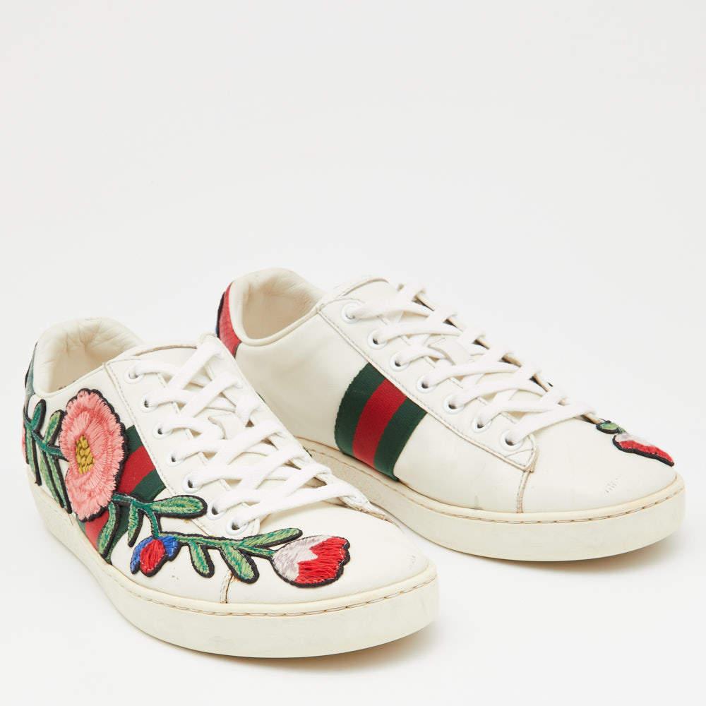 Coming in a classic silhouette, these Gucci Ace sneakers are a seamless combination of luxury, comfort, and style. These sneakers are designed with signature details and comfortable insoles.

