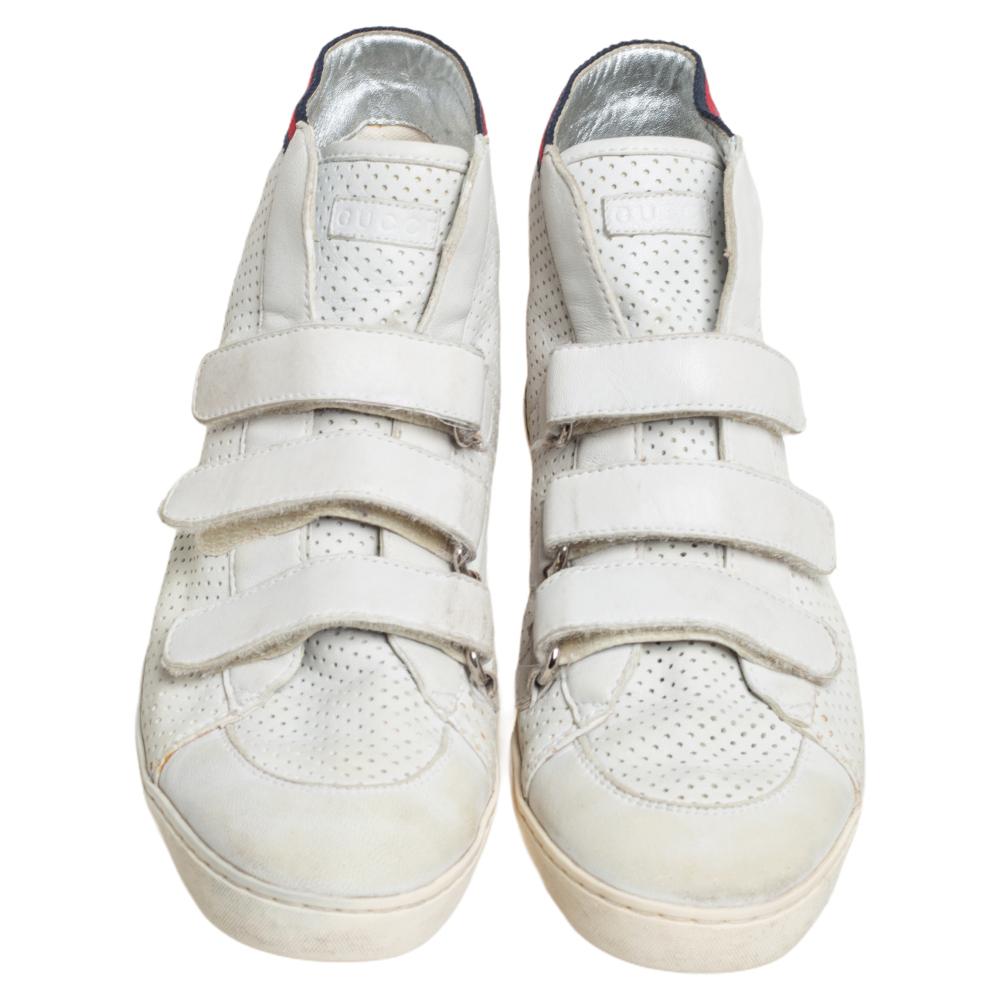 These leather sneakers are fashionable numbers that you can definitely splurge on. Amp up your style quotient with these fabulous Gucci sneakers made from leather and elevated by velcro straps.

