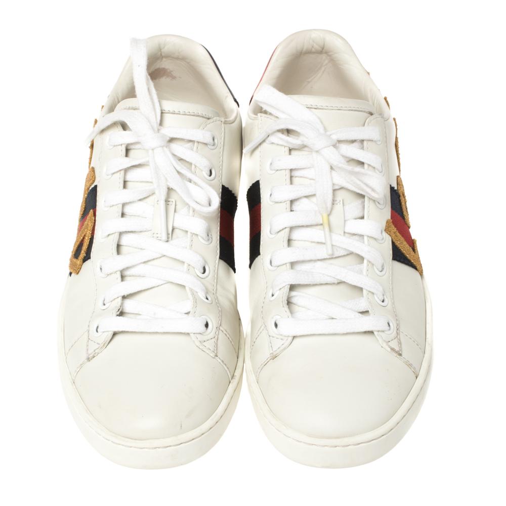 Crafted from white leather, these sneakers are just what you need for your casual outings. The Ace sneaker's retro-inspired style is embellished with a 'Loved' appliqué along the sides—a rendition of the phrase 'Blind for Love' which has become