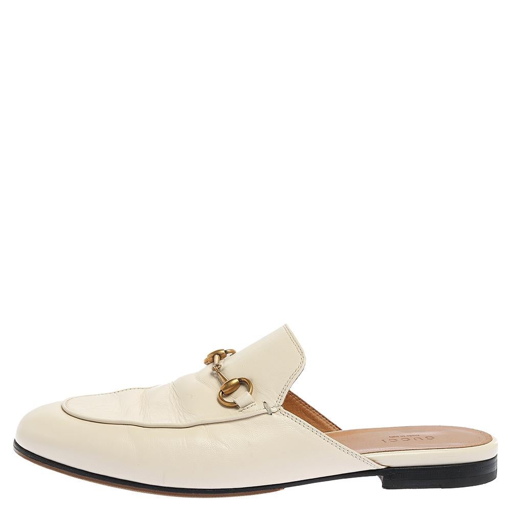 First introduced as part of Gucci's Fall Winter 2015 collection, the Princetown mules are an absolute favorite worldwide and have been worn by countless celebrities. These mules have been designed in white leather and detailed with the signature