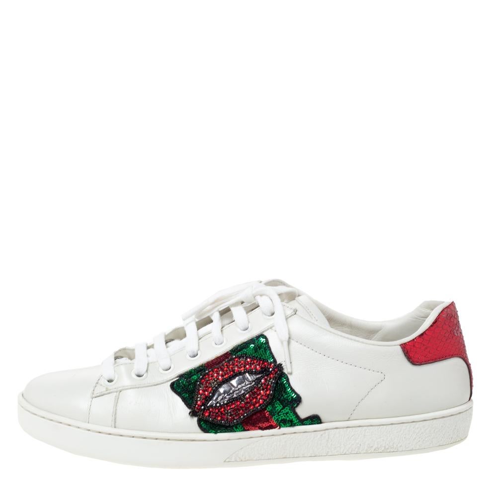 Stacked with signature details, this Gucci pair is rendered in leather and is designed in a low-cut style with lace-up vamps. They have been fashioned with embellishments and contrast trims carrying the brand label on the counters. These shoes can