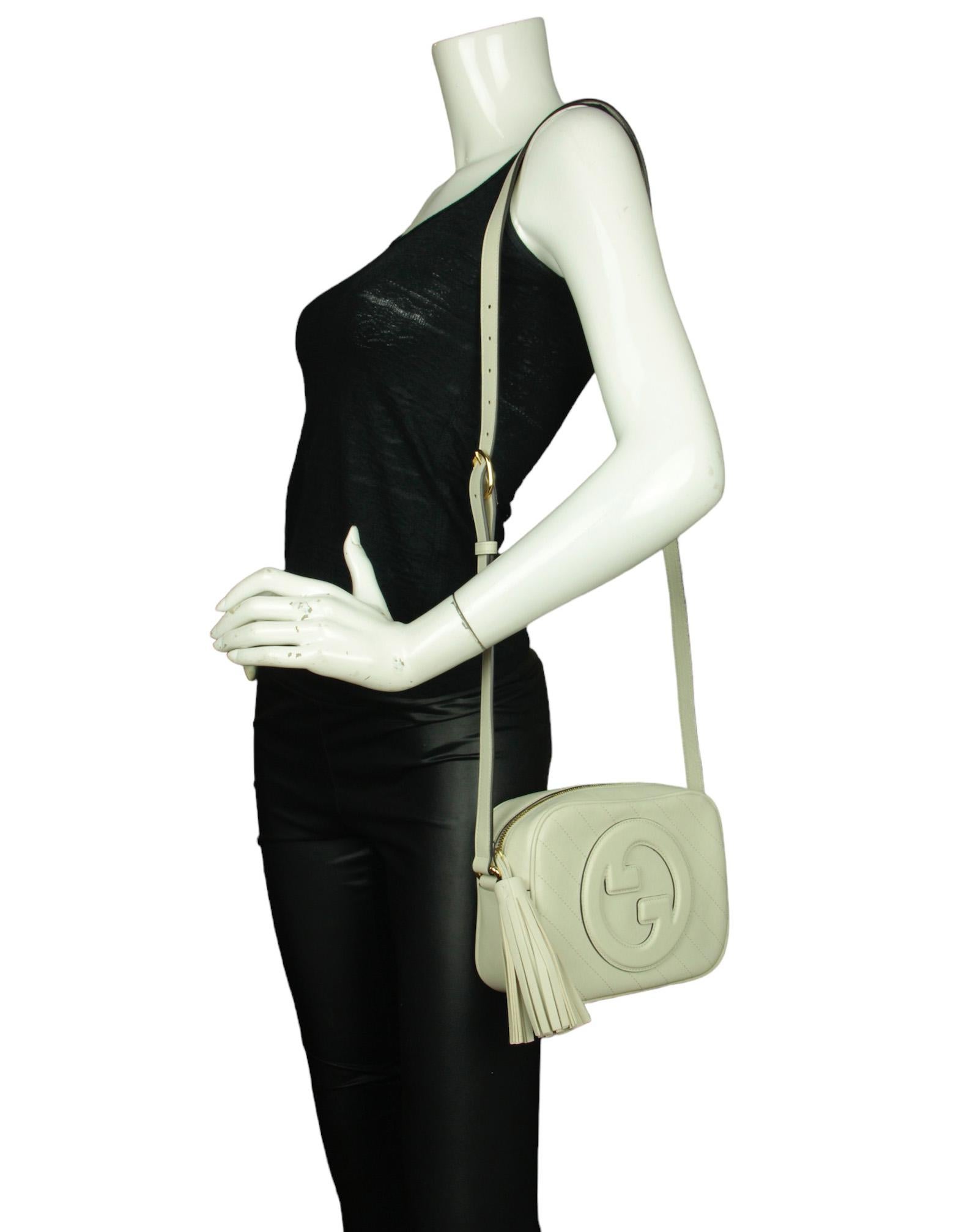 Gucci White Leather Small Blondie Crossbody Bag

Made In: Italy
Color: White
Hardware: Goldtone
Materials: leather
Lining: Cotton linen
Closure/Opening: Zip top
Exterior Pockets: None
Interior Pockets: One flat
Exterior Condition: New
Interior