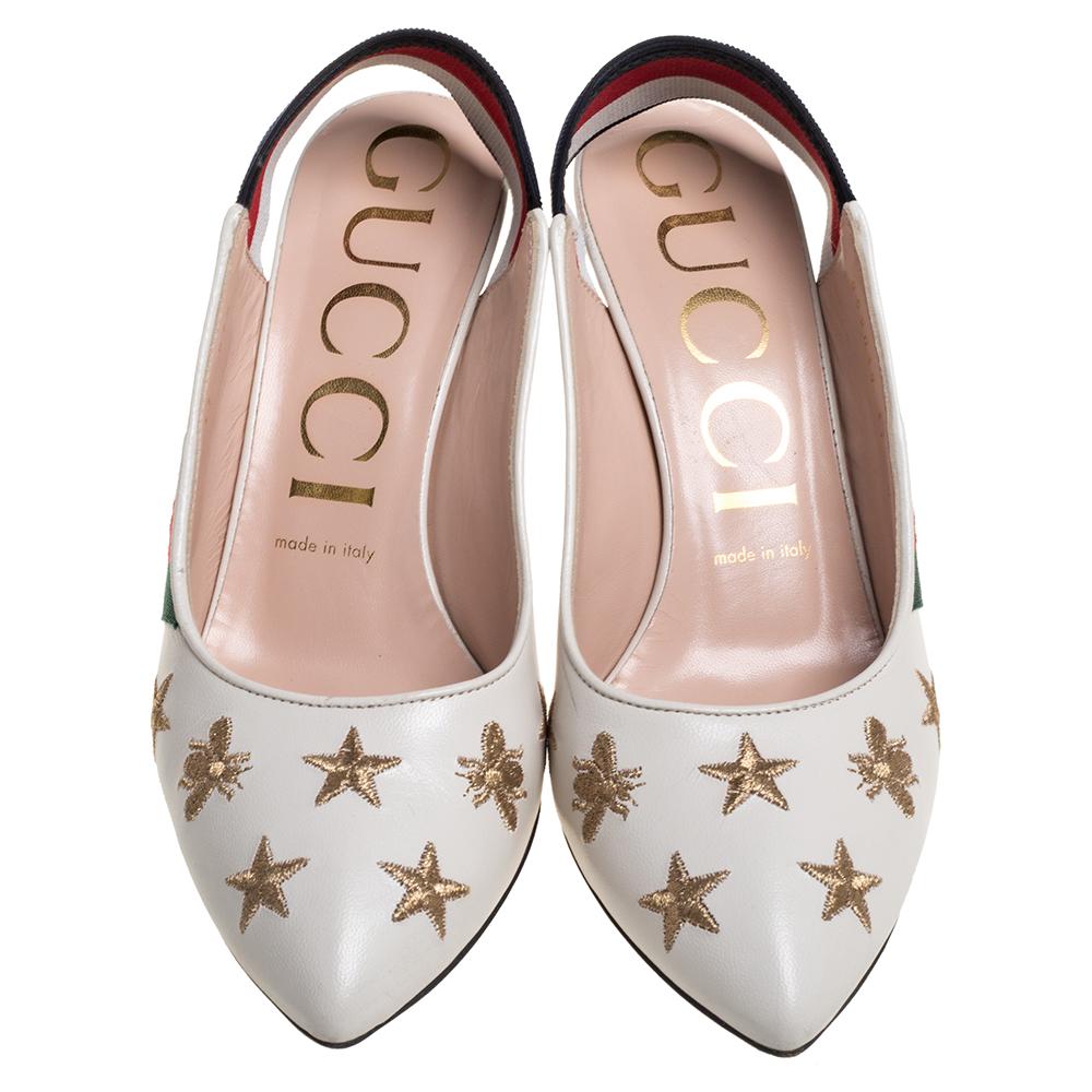 Amp up any outfit with these Gucci Sylvie pumps. Crafted from quality leather in Italy, they feature the signature web strap as elastic slingbacks with pointed toes and sleek 7.5 cm stiletto heels. The white exterior is contrasted with