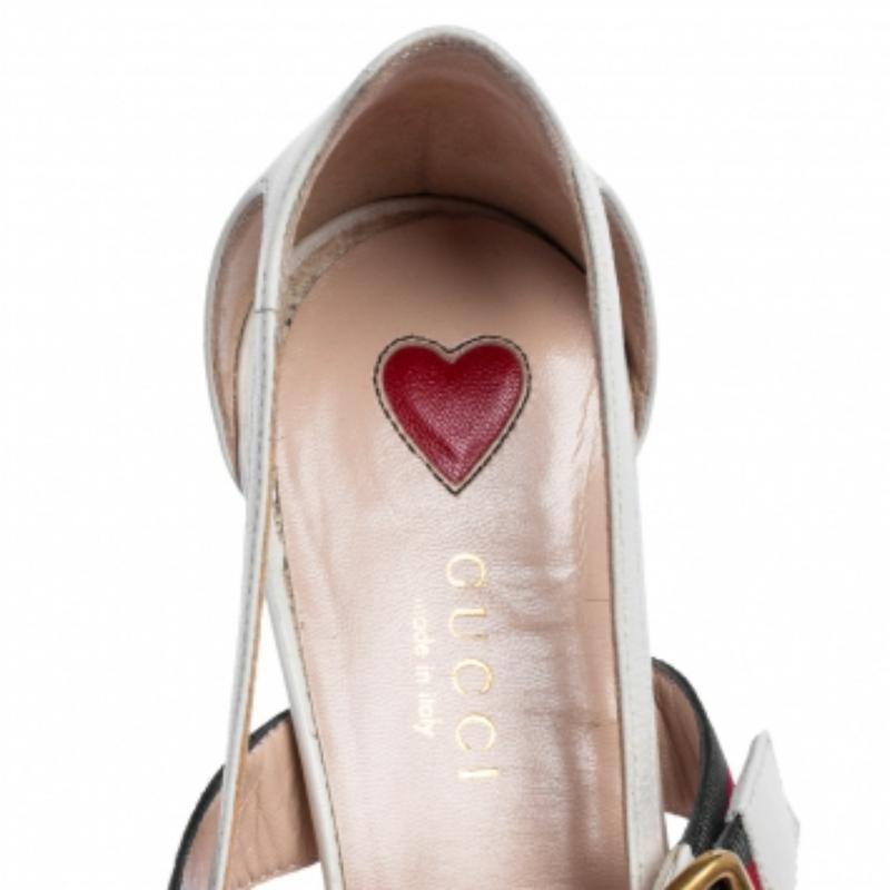 These Unia pumps from Gucci have come straight from a shoe lover's dream. Crafted in Italy from quality leather, they come in a lovely shade of white. Detailed with pointed toes, buckled web straps, gold-tone hardware and balanced on 5.5 cm bamboo