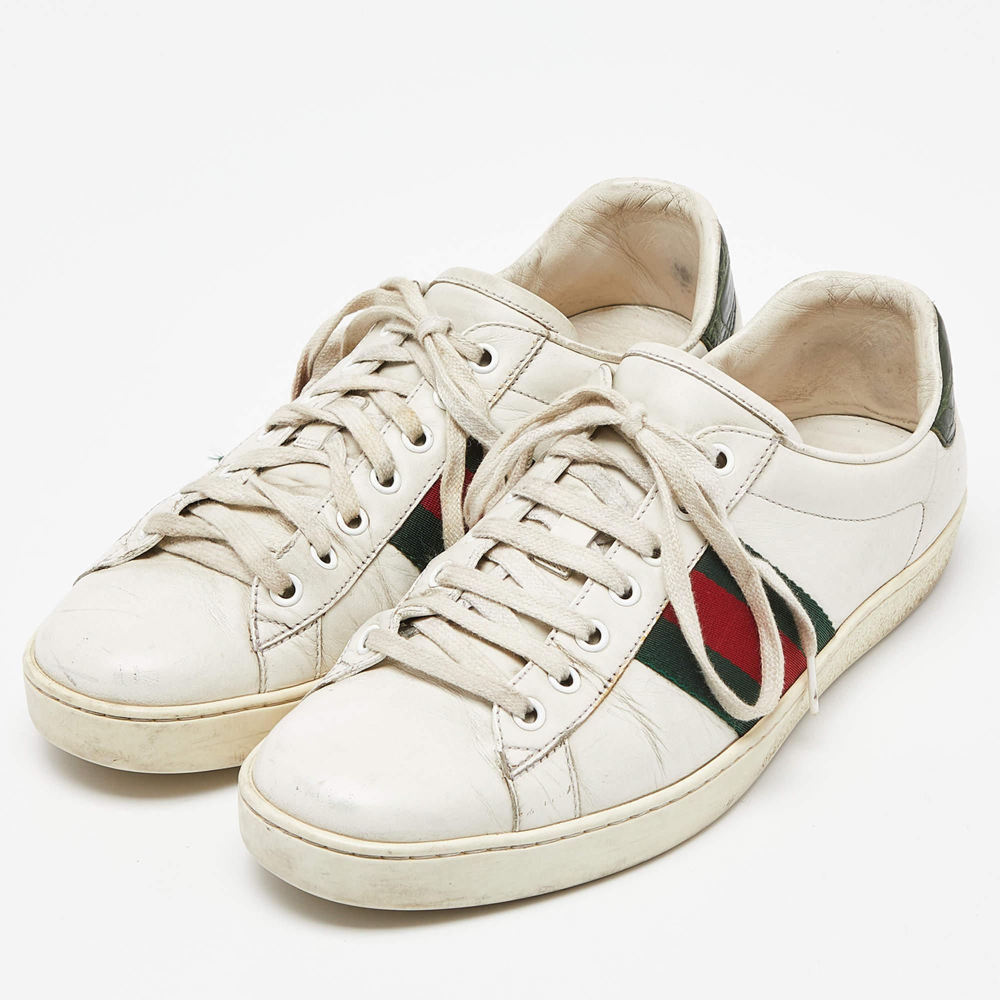 Give your outfit a chic update with this pair of Gucci white Ace sneakers. The creation is sewn perfectly to help you make a statement in them for a long time.

