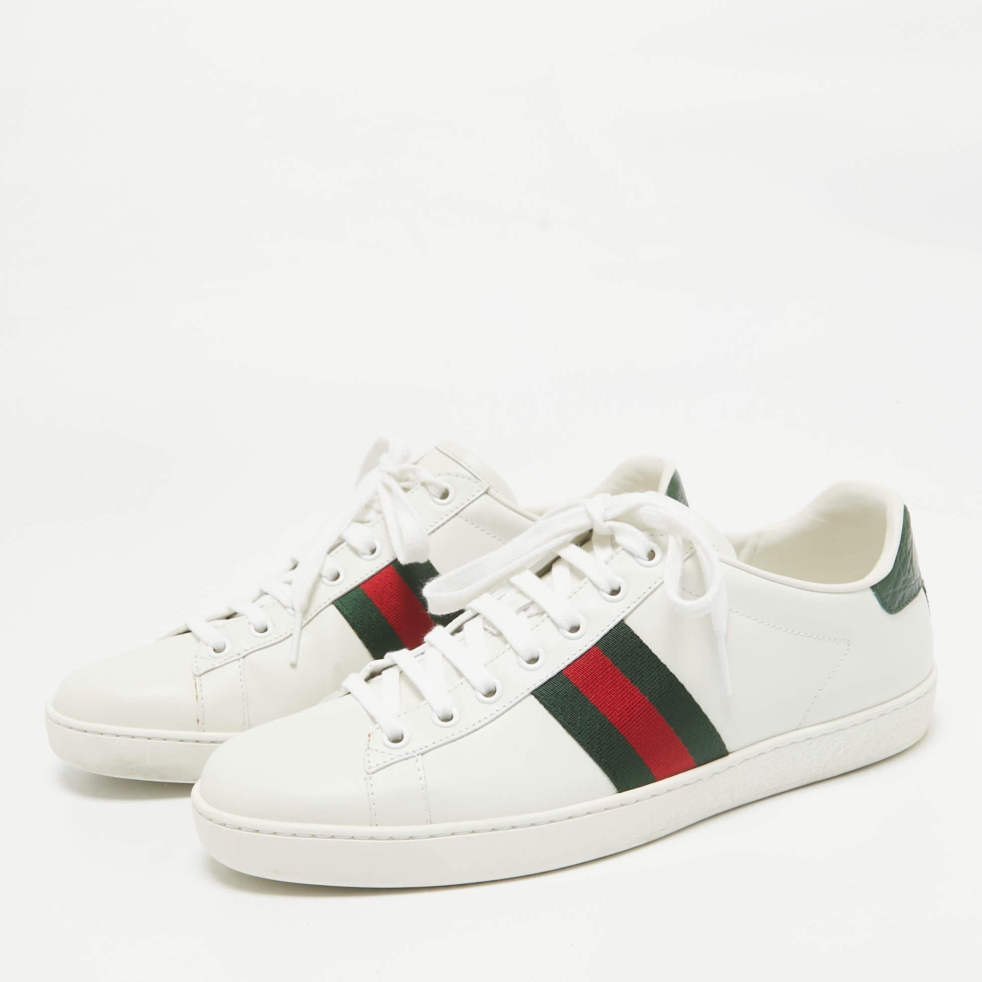 Stacked with signature details  this Gucci pair is rendered in leather and is designed in a low cut style with lace up vamps. They have been fashioned with the iconic Web stripes. Complete with the brand name on the counters  these shoes can be