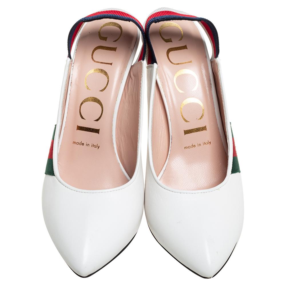 Amp up any outfit with these Gucci pumps. Crafted from quality leather in Italy, they feature the signature Web strap as elastic slingbacks, comfortable pointed toes, and 11 cm stiletto heels. The white shade is contrasted with bee-embroidered Web