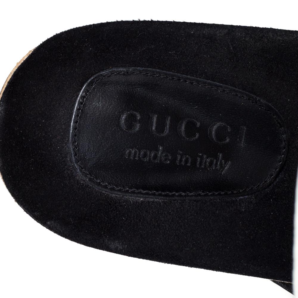 Gucci's flats exhibit the brand's flair to make chic designs with subdued charm. Crafted from patent leather in an open-toe silhouette, these flats are comfortable, stylish, and can be worn with casual outfits for a minimal look.

