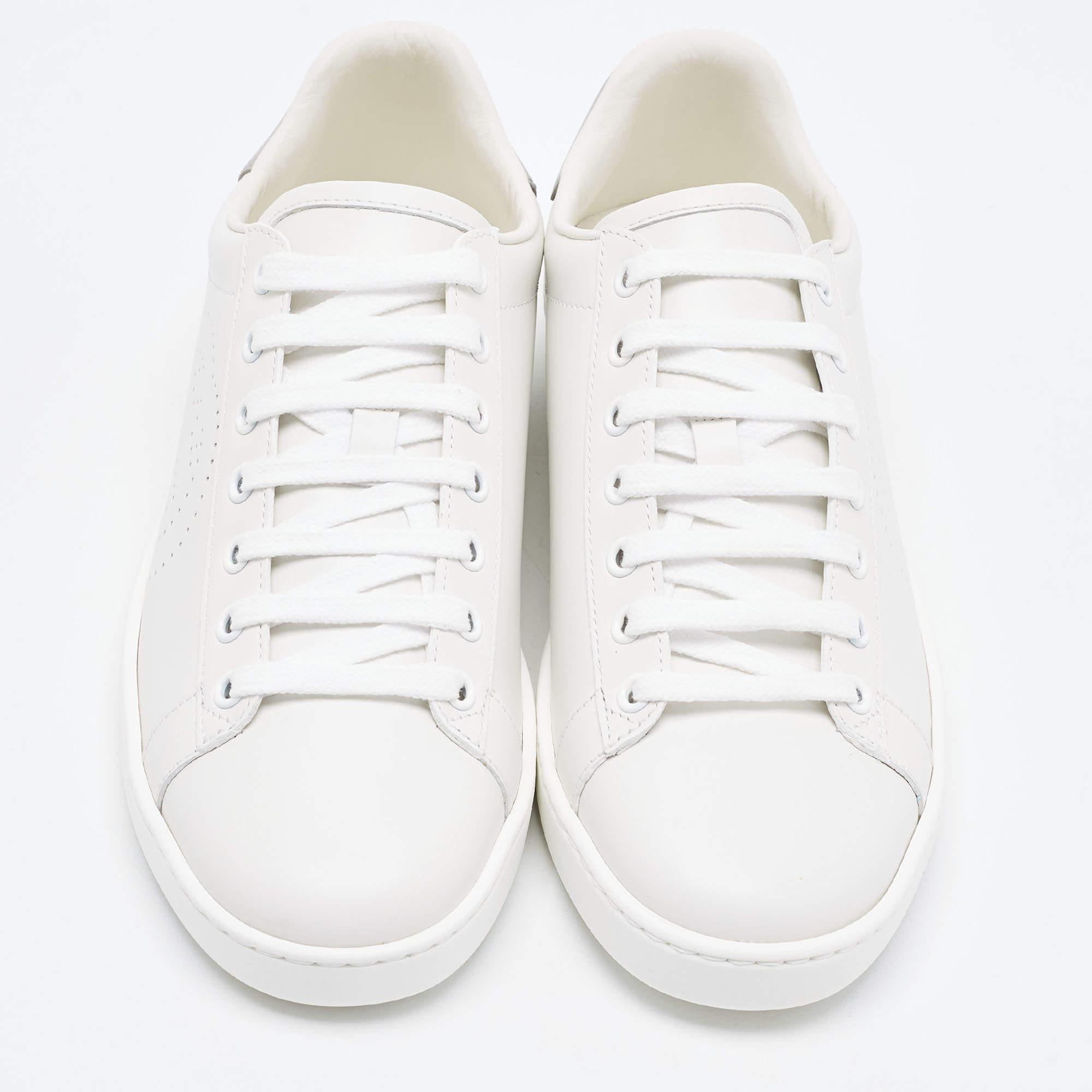 Give your outfit a chic update with this pair of designer sneakers. The creation is sewn perfectly to help you make a statement in them for a long time.

Includes
Original Dustbag, Original Box, Extra Lace