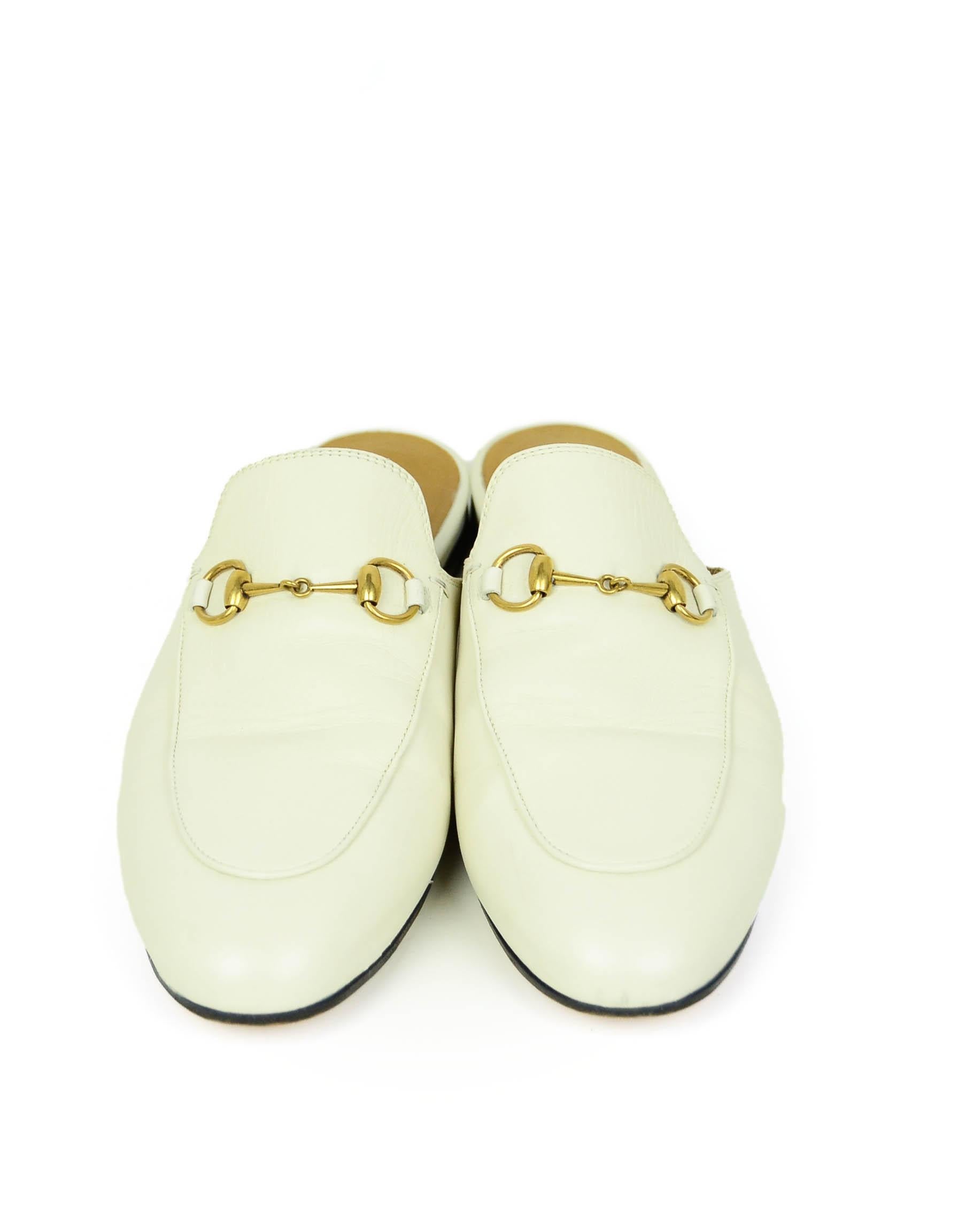 Gucci White Princetown Loafer Mules sz 39.5

Made In: Italy
Year of Production: 2019-2020
Color: Off white
Hardware: Goldtone
Materials: Leather
Closure/Opening: Slip on
Overall Condition: Good pre-owned condition. Significant wear