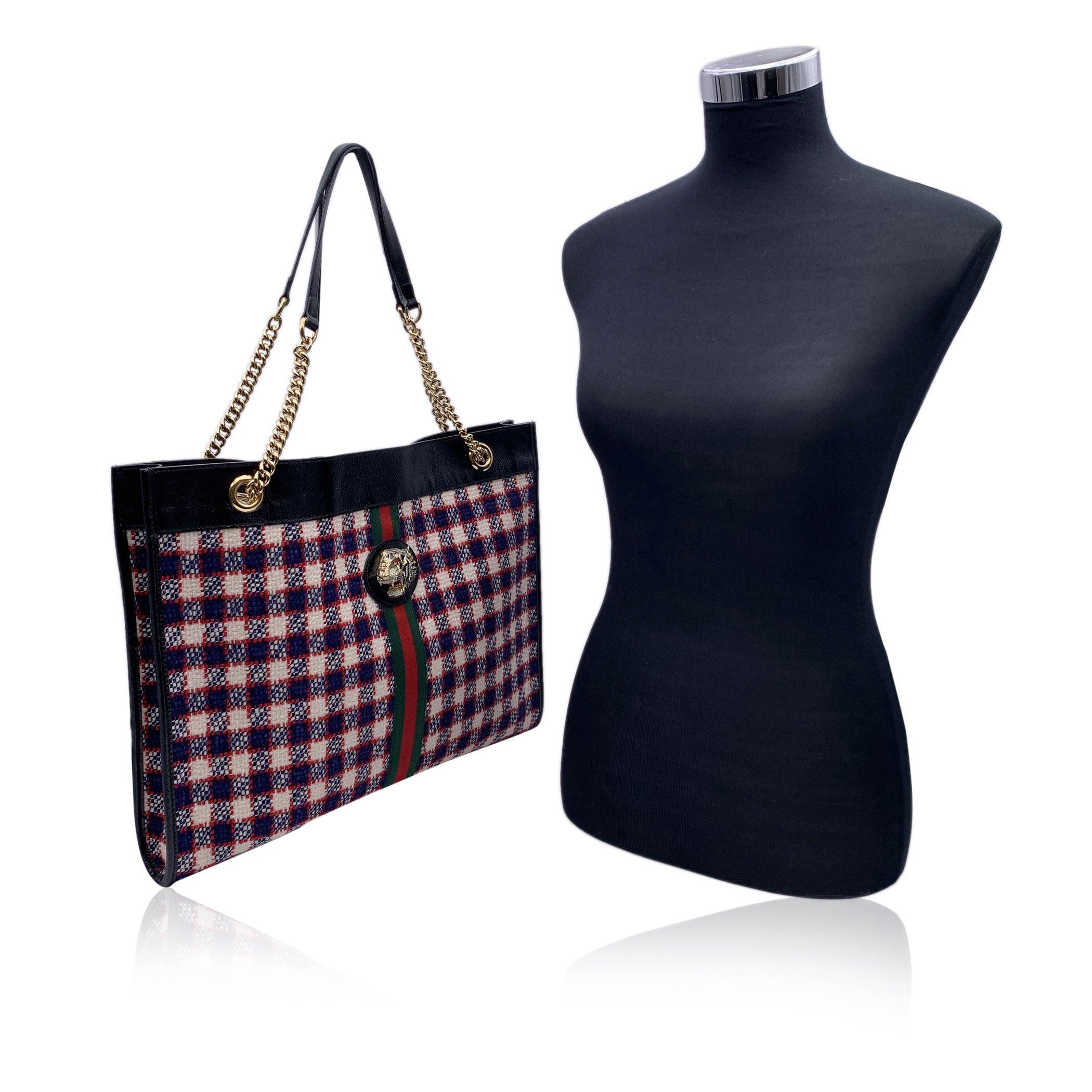 This beautiful Bag will come with a Certificate of Authenticity provided by Entrupy. The certificate will be provided at no further cost Gucci 'Rajah' Large Tote. The bag is crafted of white, blue and red checkered wool fabric and black patent
