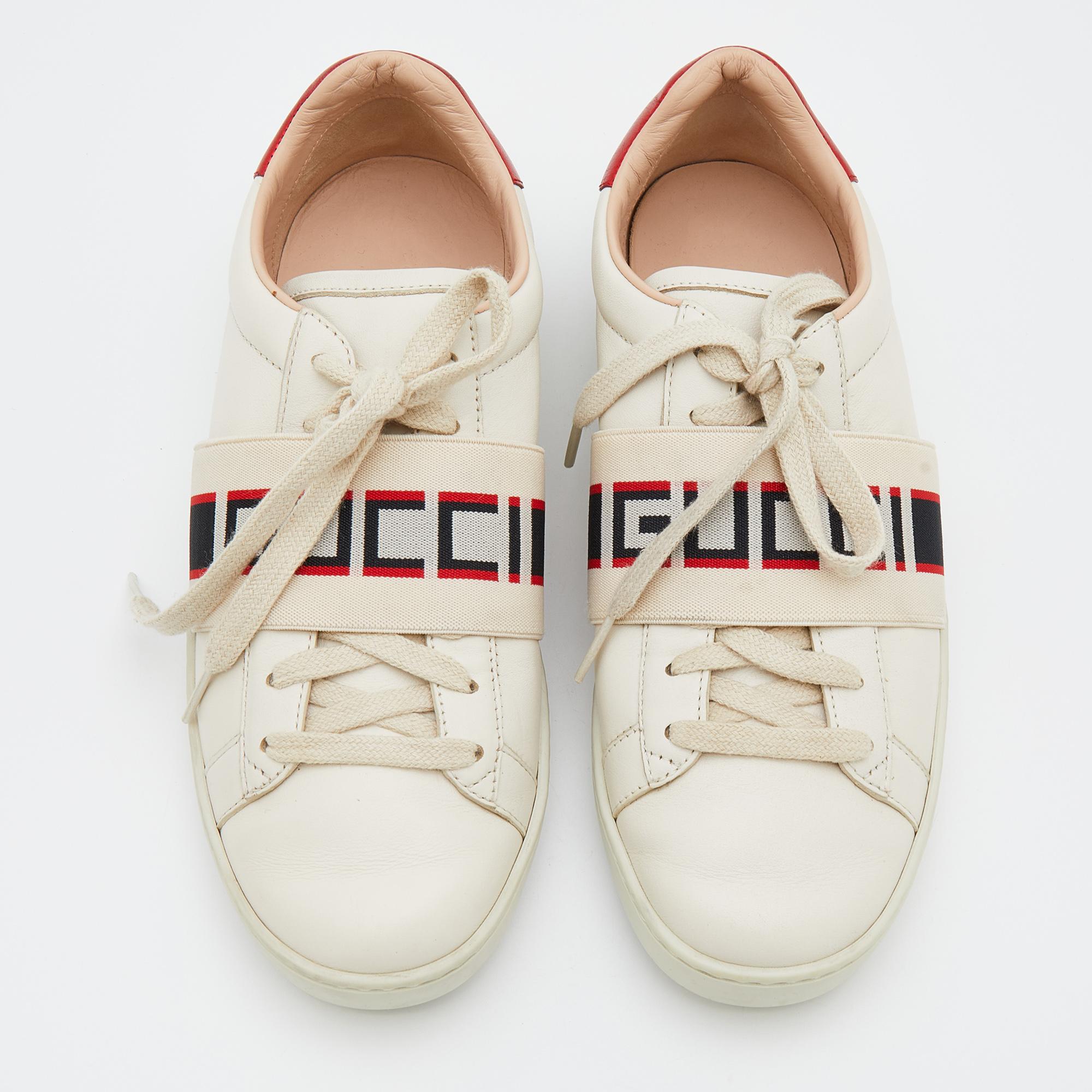 Stacked with signature details, this Gucci pair is rendered in leather and is designed in a low-cut style with lace-up vamps. The sneakers feature logo straps over the vamps, durable rubber soles for lasting wear and red panels on the counters.

