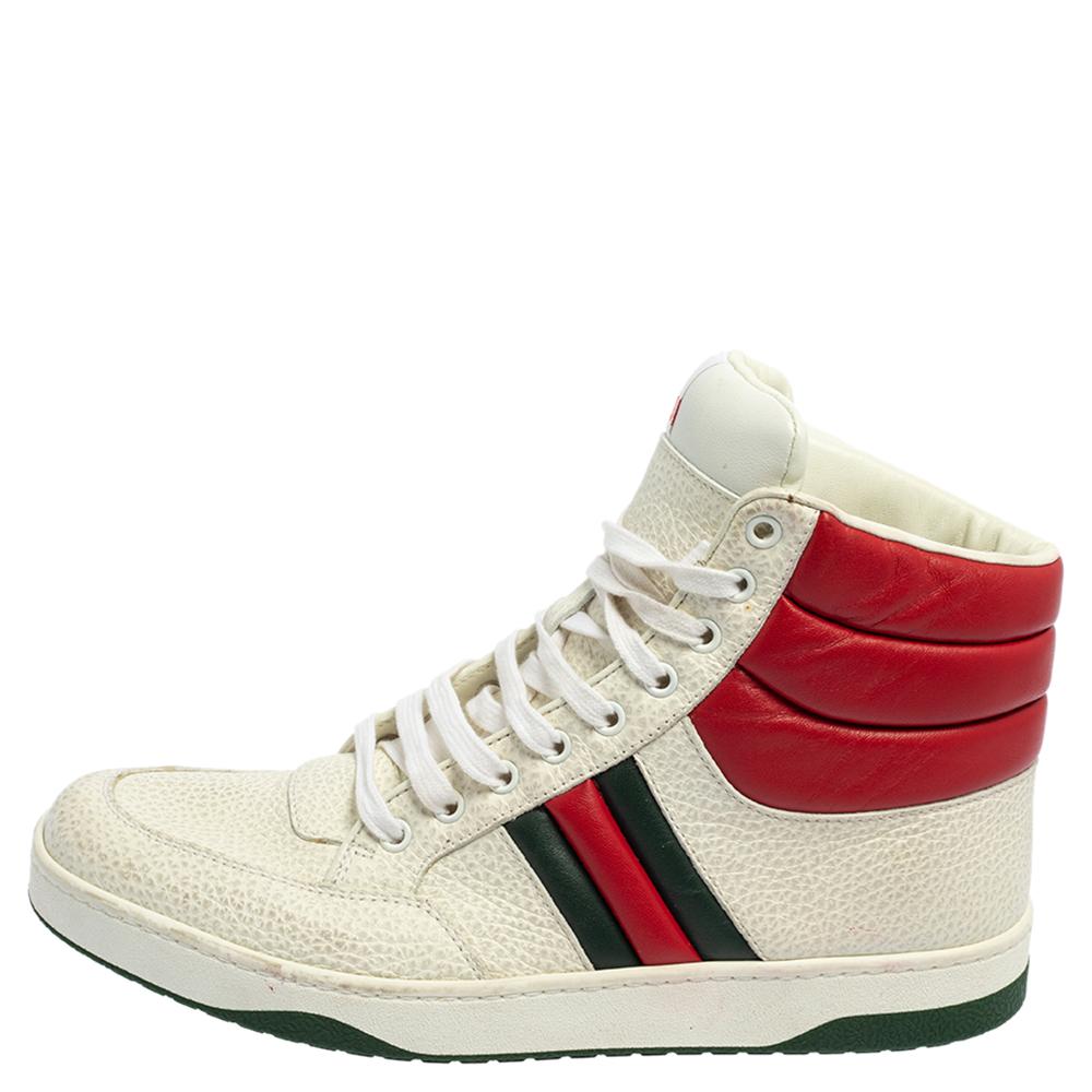 These Gucci sneakers just uplift the style quotient to a new level. Crafted with quality leather, this Praga pair features the signature Web design on the sides and horizontal quilting on the counters. In the dual tones of white and red, this