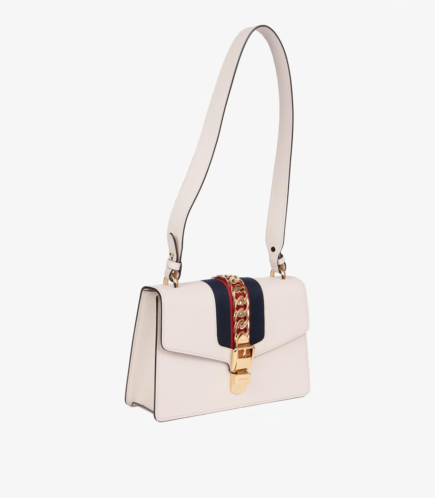 Gucci White Smooth Calfskin Leather , Red & Blue Web Small Sylvie

Brand- Gucci
Model- Small Sylvie
Product Type- Shoulder
Serial Number- 42*******
Accompanied By- Care Booklet, Leather Swatch
Colour- White
Hardware- Gold
Material(s)- Calfskin