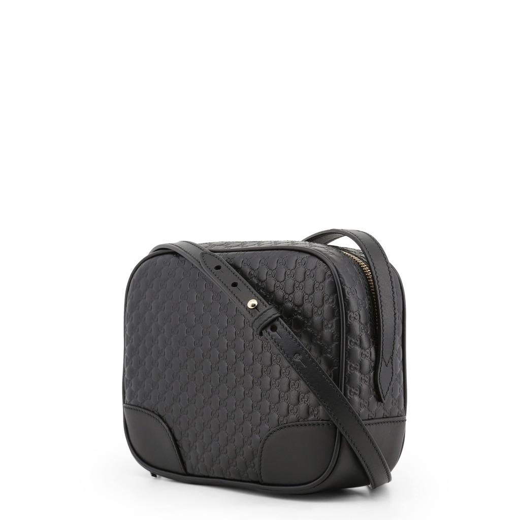Item number 449413_3BMJ1G-1000 
Color black
Upper leather
Lining canvas, leather
Compartments: 1 main compartment, 2 slide-in compartments, 8 card compartments
Closure zipper
Weight in grams about 350
Shoulder strap with approx. 120 cm - 130 cm
