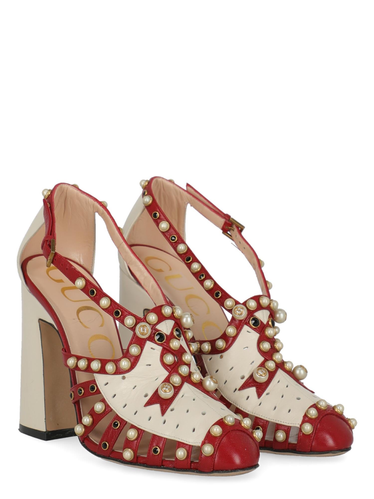 Product Description: Pumps, leather, solid color, open on the side, buckle fastening, gold-tone hardware, round toe, branded insole, branded sole, block heel, high heel, pearl embellishment

Includes: N/A

Product Condition: Very Good
Heel: slightly