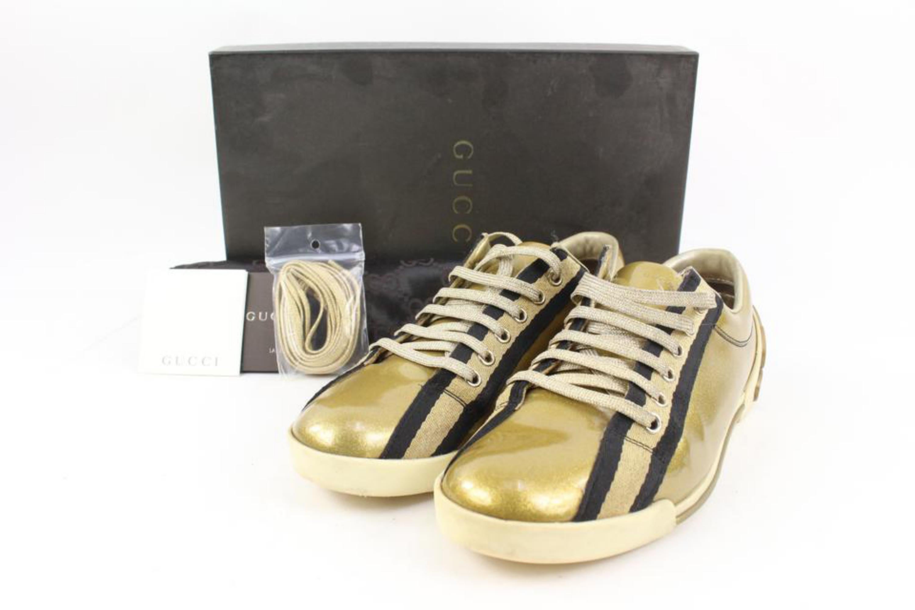Gucci Women's 38.5 Metallic Gold Script Logo Web Low Sneaker 27g31s
Date Code/Serial Number: 168038
Made In: Italy
Measurements: Length:  10.8