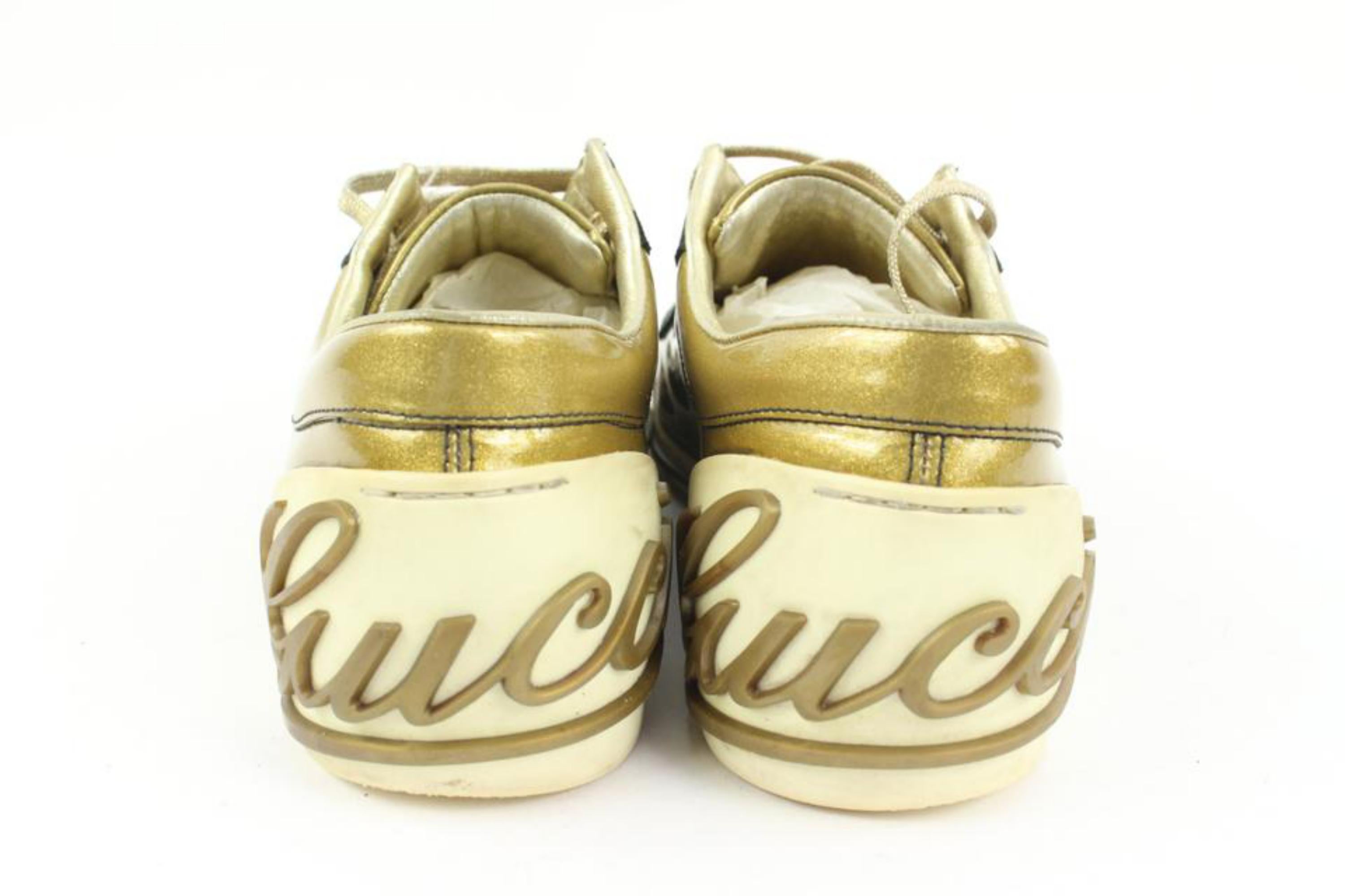 Gucci Women's 38.5 Metallic Gold Script Logo Web Low Sneaker 27g31s In Good Condition In Dix hills, NY