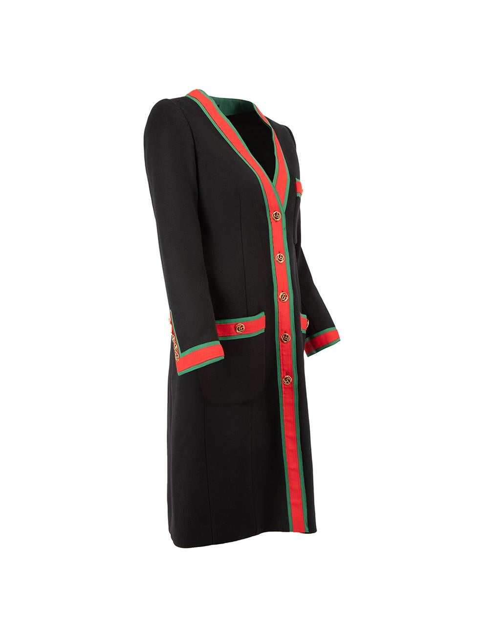 CONDITION is Very good. Minimal wear to coat is evident. Minimal wear to the red trim that goes down the middle where some loose thread can be seen on this used Gucci designer resale item. 
 
 Details
  Black
 Wool
 Long coat
 Single breasted with
