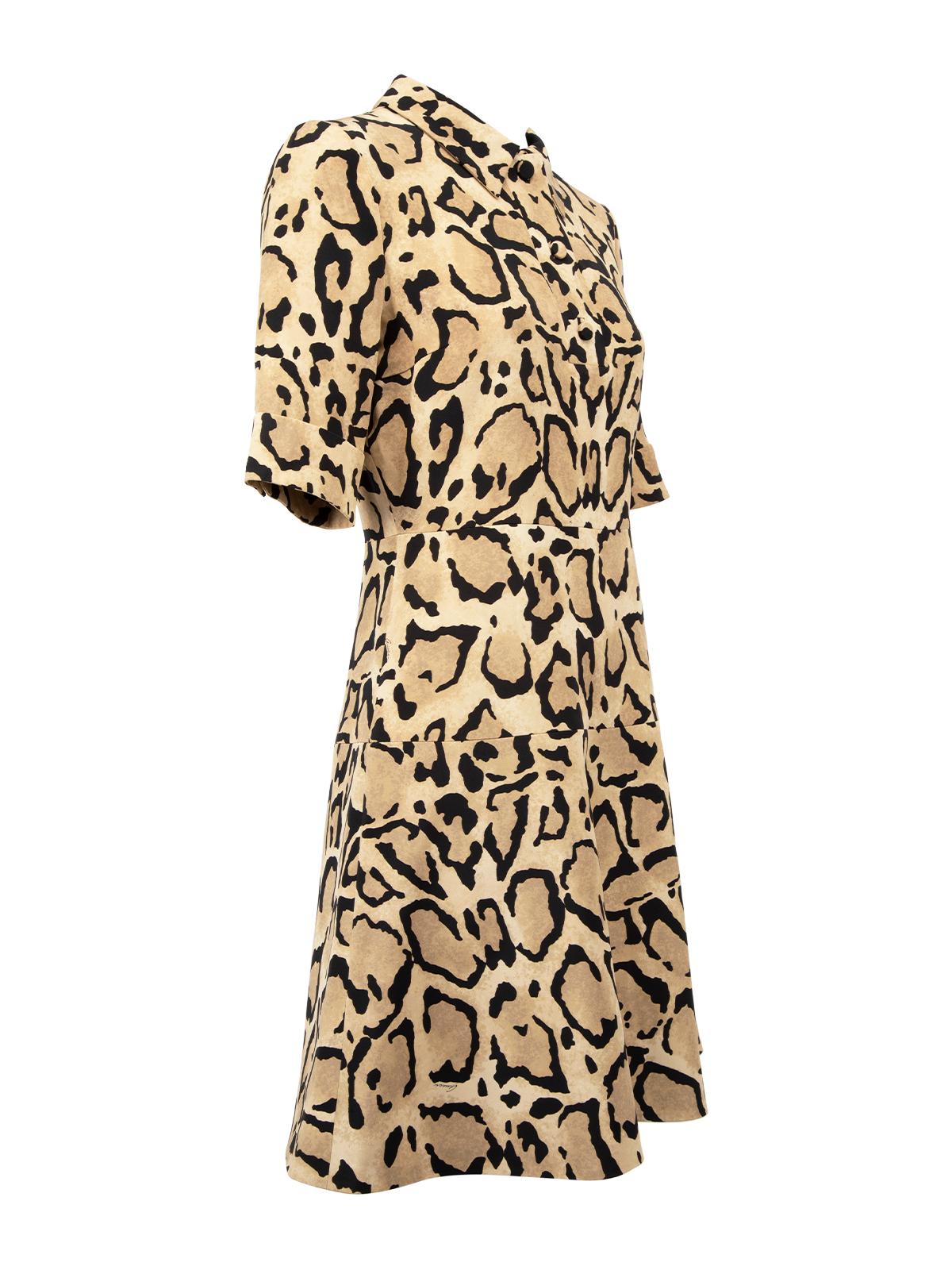 CONDITION is Never Worn. No visible wear to dress is evident on this used Gucci designer resale item. Details Brown Leopard print Silk Silk lining Collared Short sleeves Triple button neck line Fitted A-line skirt Zip and clasp back fastening Made
