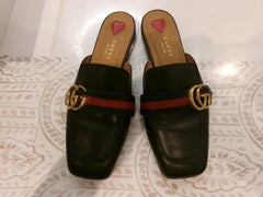 Gucci Women's Peyton Mules Black Leather with stripe detail size 35.5
