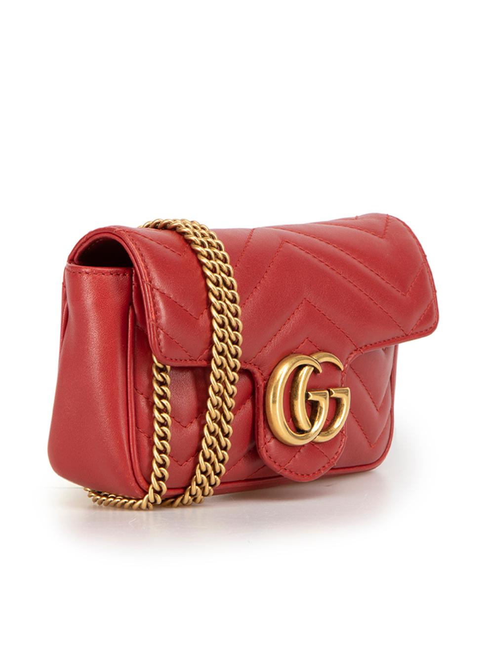 CONDITION is Very good. Minimal wear to bag is evident. Minor scratching along leather on side and base of this used Gucci designer resale item.



Details


Red

Leather

Mini crossbody bag

Gold tone hardware

GG Logo

Detachable chain