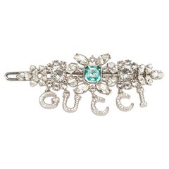 Gucci Women
s Silver Tone Crystal Logo Hair Clip