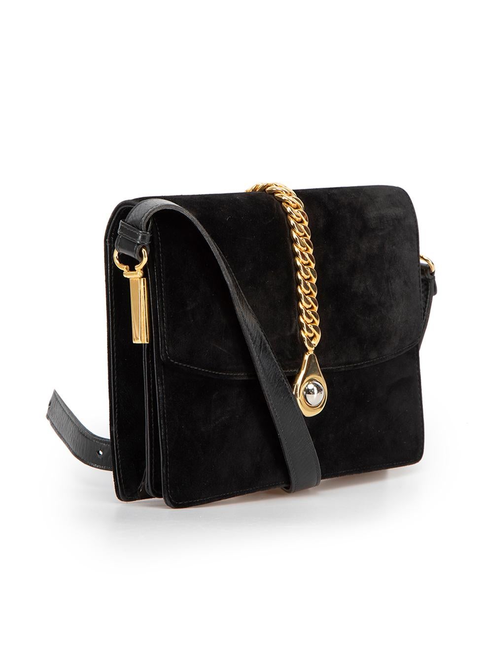 CONDITION is Very good. Minimal wear to bag is evident. Minimal wear to the exterior of the suede with scuff marks on this used Gucci designer resale item. 



Details


Black

Suede

Mini shoulder bag

1x Adjustable shoulder strap

Gold chain