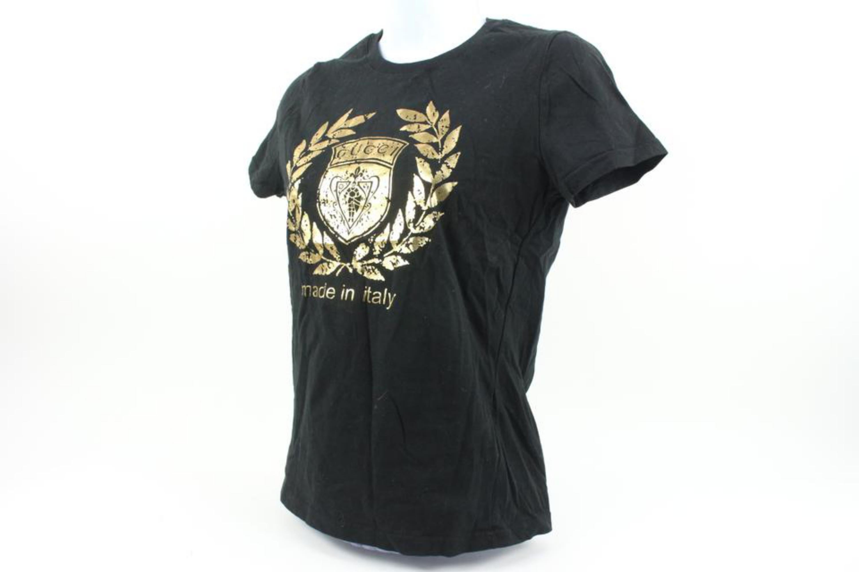 Gucci Women's XS Black x Gold Crest Logo T-Shirt Tee Shirt 120g28
Date Code/Serial Number: EABB 2008 01339
Made In: Italy
Measurements: Length:  16.5