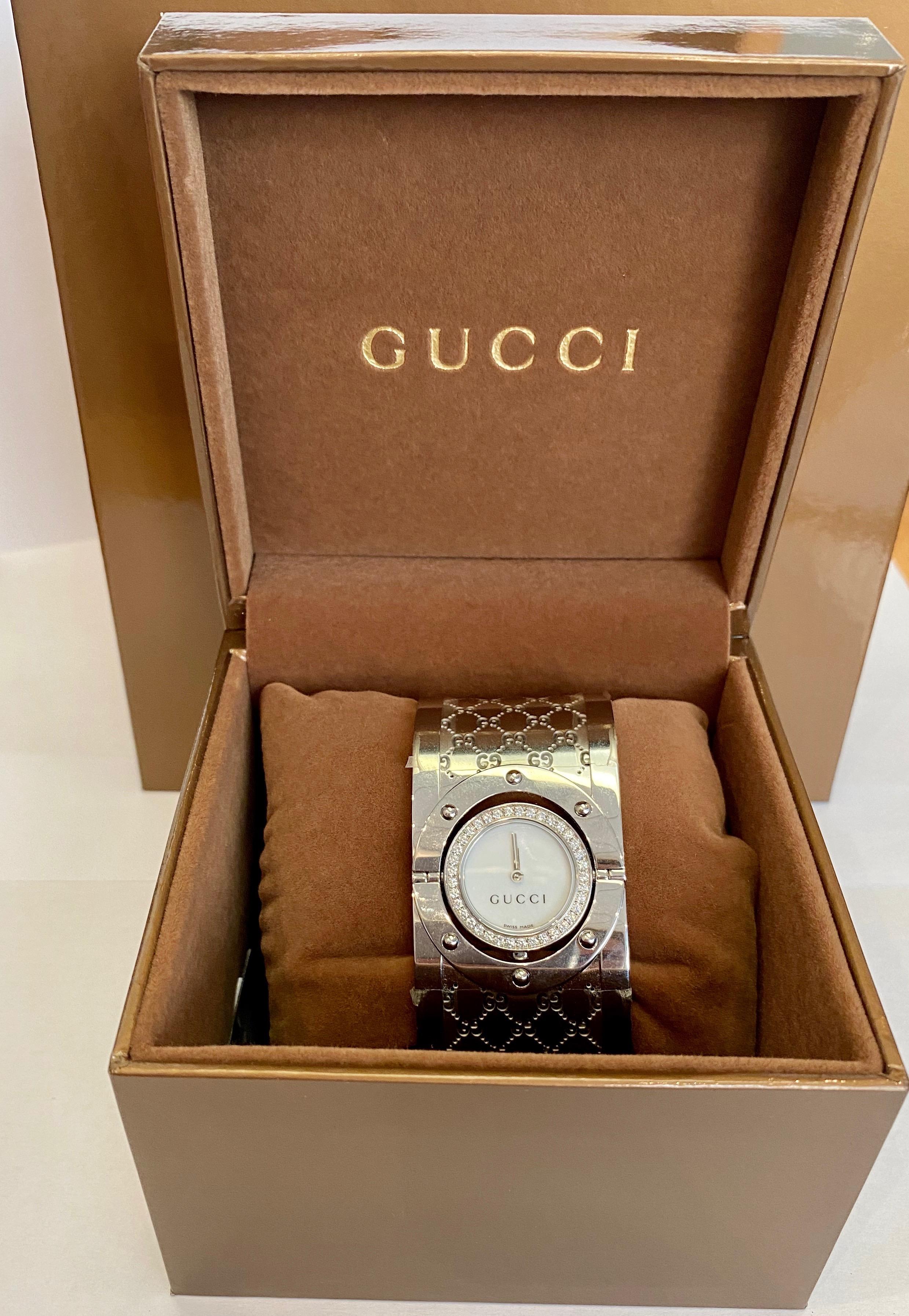 New with tags GUCCI Women's YA112416 Twirl Watch with White Dial and diamond bezel, diamonds weighting in total 2.60 carats:

Quartz movement
Scratch resistant sapphire crystal
Case diameter:23 mm
Stainless steel case
Women's Band width: 33