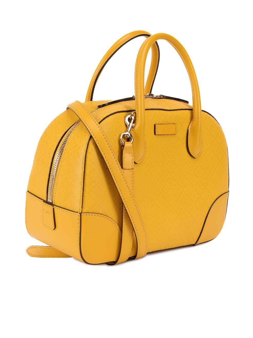 CONDITION is Very good. Minimal wear to bag is evident. Minimal wear to the back of bag and zip line where some small marks can be seen on this used Gucci designer resale item. This items includes the original dustbag.   Details  Yellow Leather