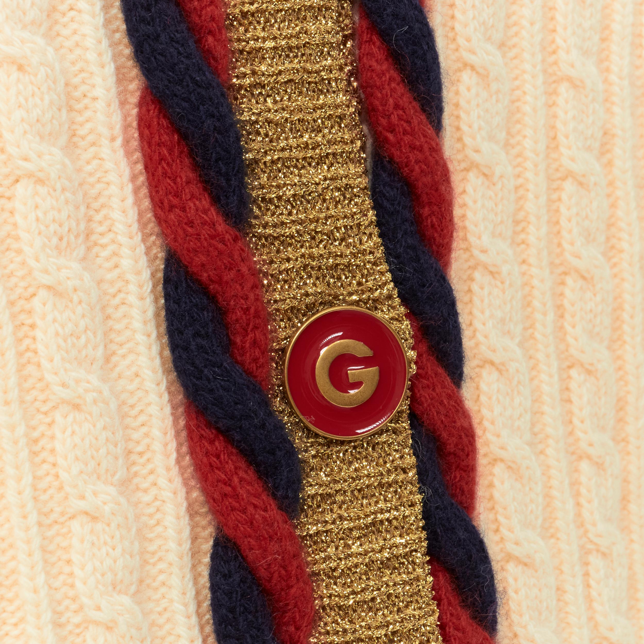GUCCI wool cashmere cream cable knit navy red web rope trim cardigan XXS 
Reference: TGAS/B02066 
Brand: Gucci 
Designer: Alessandro Michele 
Material: Wool 
Color: Beige 
Pattern: Solid 
Closure: Button 
Extra Detail: Wool cashmere blend. Cable