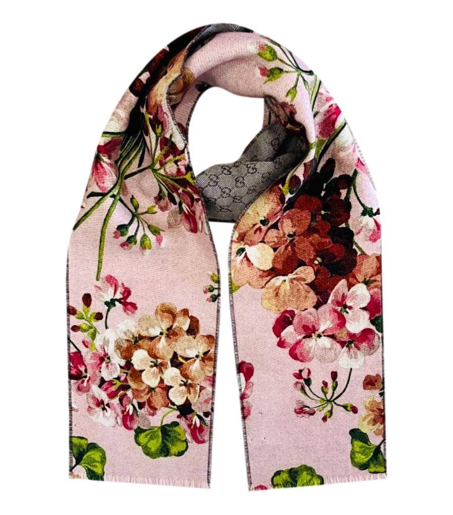 Gucci Wool GG Monogram Miniorophin Wool Scarf
Pink scarf designed with blooms print in Antique Rose to one side with grey GG Monogram to reverse, detailed with frayed edges.
Size – 180cm x 20cm
Condition – Very Good
Composition – 100% Wool
Comes