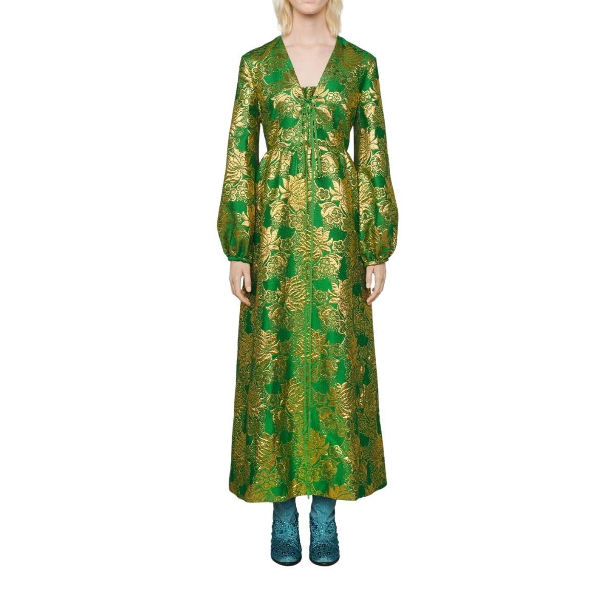 Green and gold floral patterned wool is punctuated by lamé detail on this front tie gown. Rich in pattern and decoration
Green and gold wool lamé floral jacquard
Lace detail
Due to the printing technique used, the placement of the pattern will vary