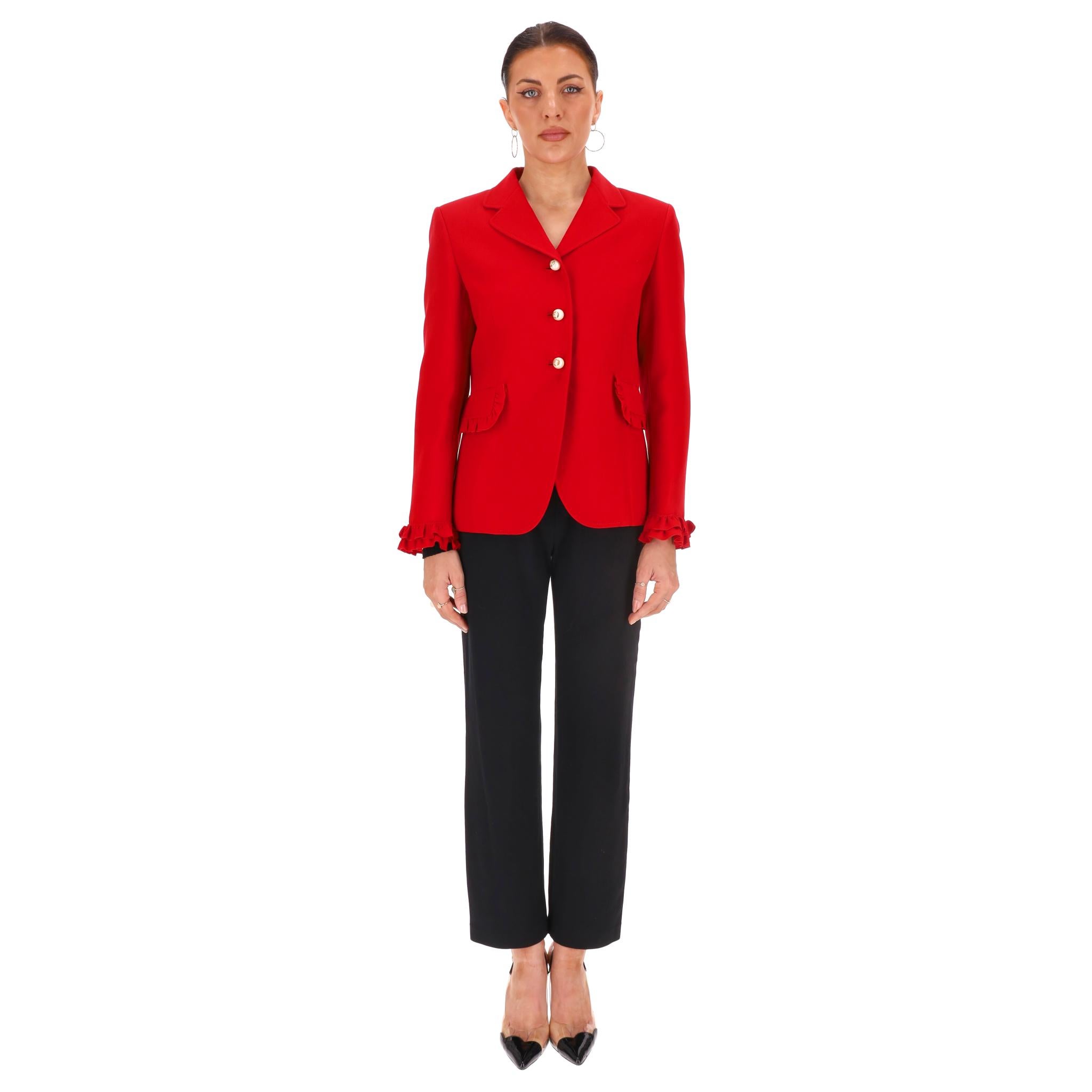 Gucci Wool & Silk Jacket With 'GG' Logo Pearl Buttons

Vibrant red jacket/blazer crafted from wool and silk blend with ruffle trimmed cuffs and flap pockets.

Embellished with oversized 'GG' pearl buttons centre closure.

Rrp Approx. £1,200

Size -