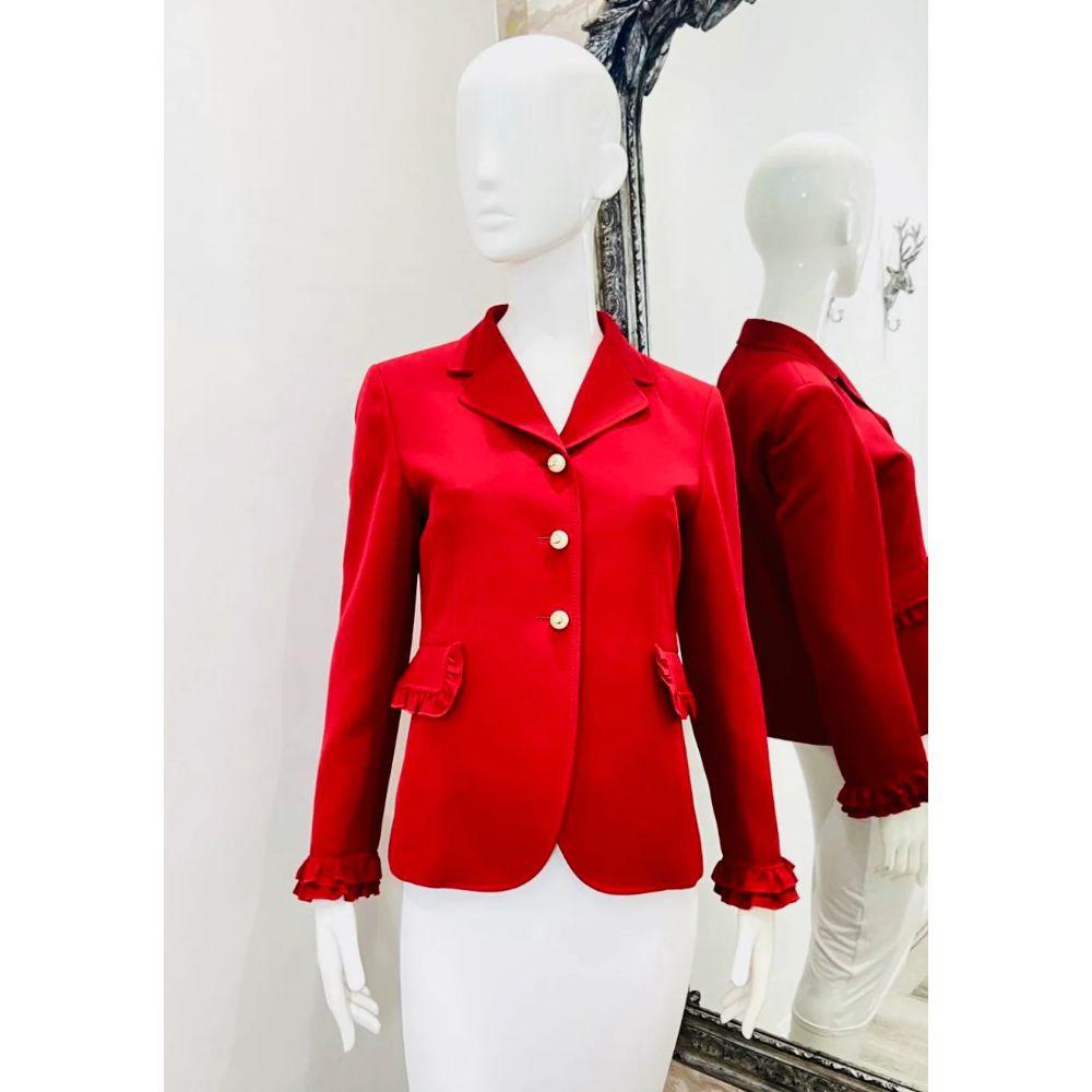 Gucci Wool & Silk Jacket with Pearl Buttons

Bright red jacket with frill cuffs and flap pockets. Large 'GG' pearl buttons closure.

Additional information:
Size: 44IT
Composition: 51% Wool. 49% Silk 
Condition: Excellent