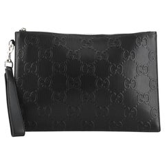 Gucci Wristlet Pouch GG Embossed Perforated Leather