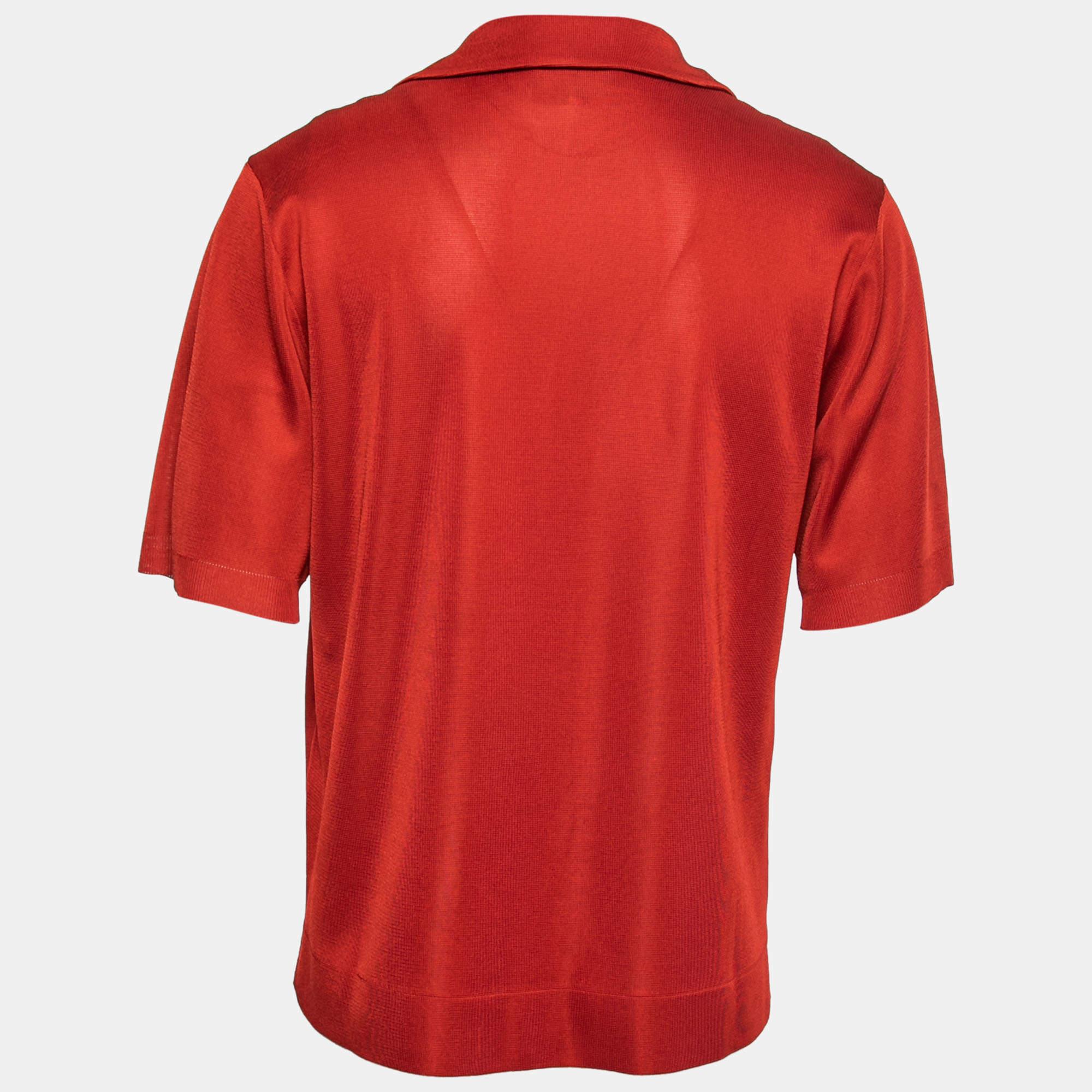 Create an elevated style statement by wearing this shirt from Gucci X Adidas. It has a well-fitted shape that is made from red knit fabric, which flaunts the signature GG Monogram. It comes with short sleeves, buttoned closures, and neat collars.

