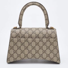 Gucci x Balenciaga Bolso de asa superior de reloj de arena de lona GG Supreme beige/marrón