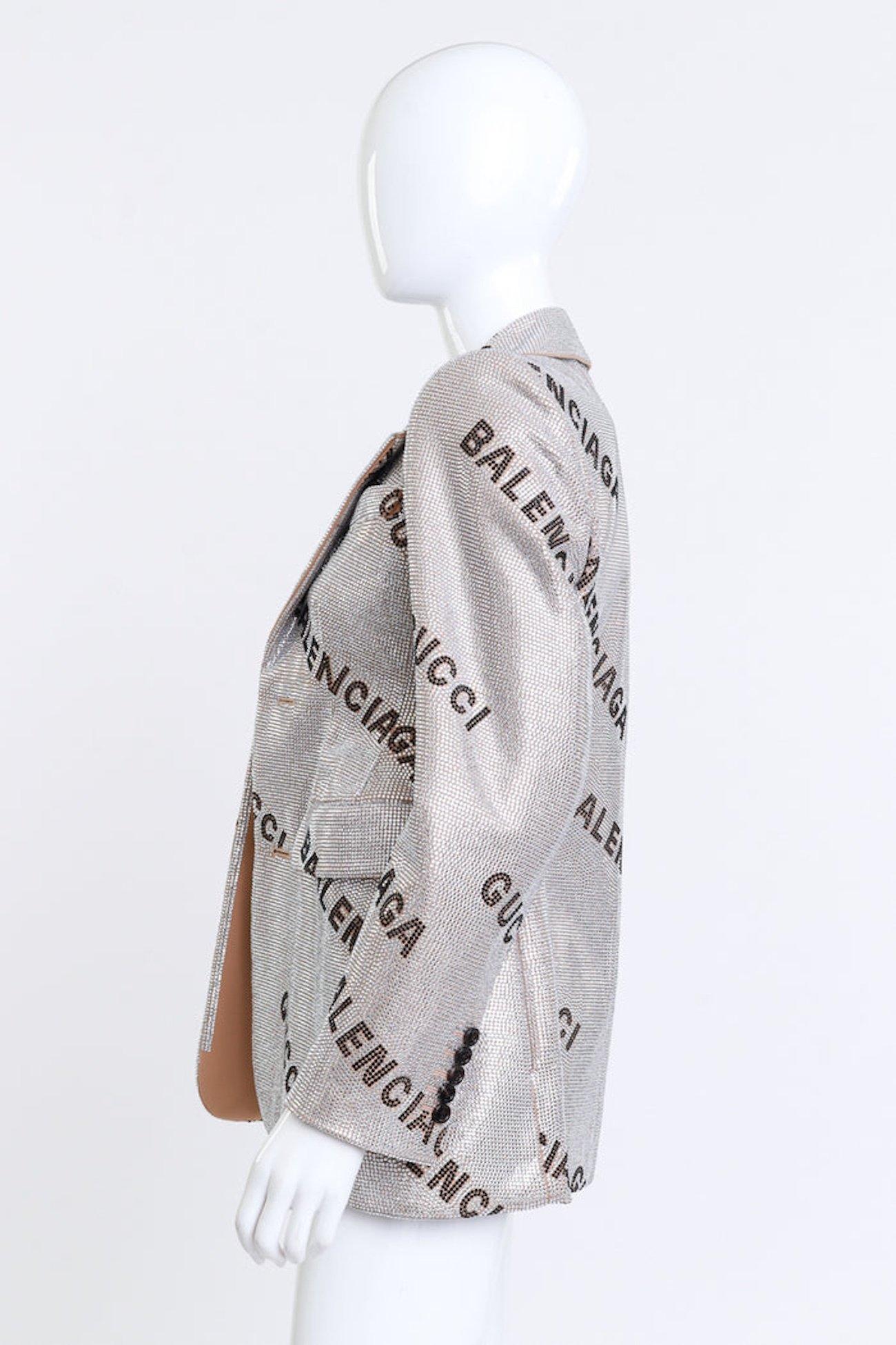 GUCCI X BALENCIAGA CRYSTAL LOGO HOURGLASS JACKET (SMALL)

This Gucci x Balenciaga crystal logo jacket is from the 100th anniversary Aria collection and features the Balenciaga 