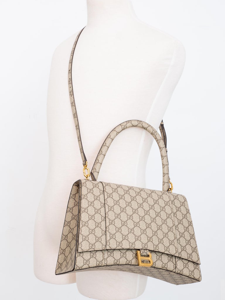 Balenciaga SS22: Hacked Gucci-handbags and high-heeled Crocs