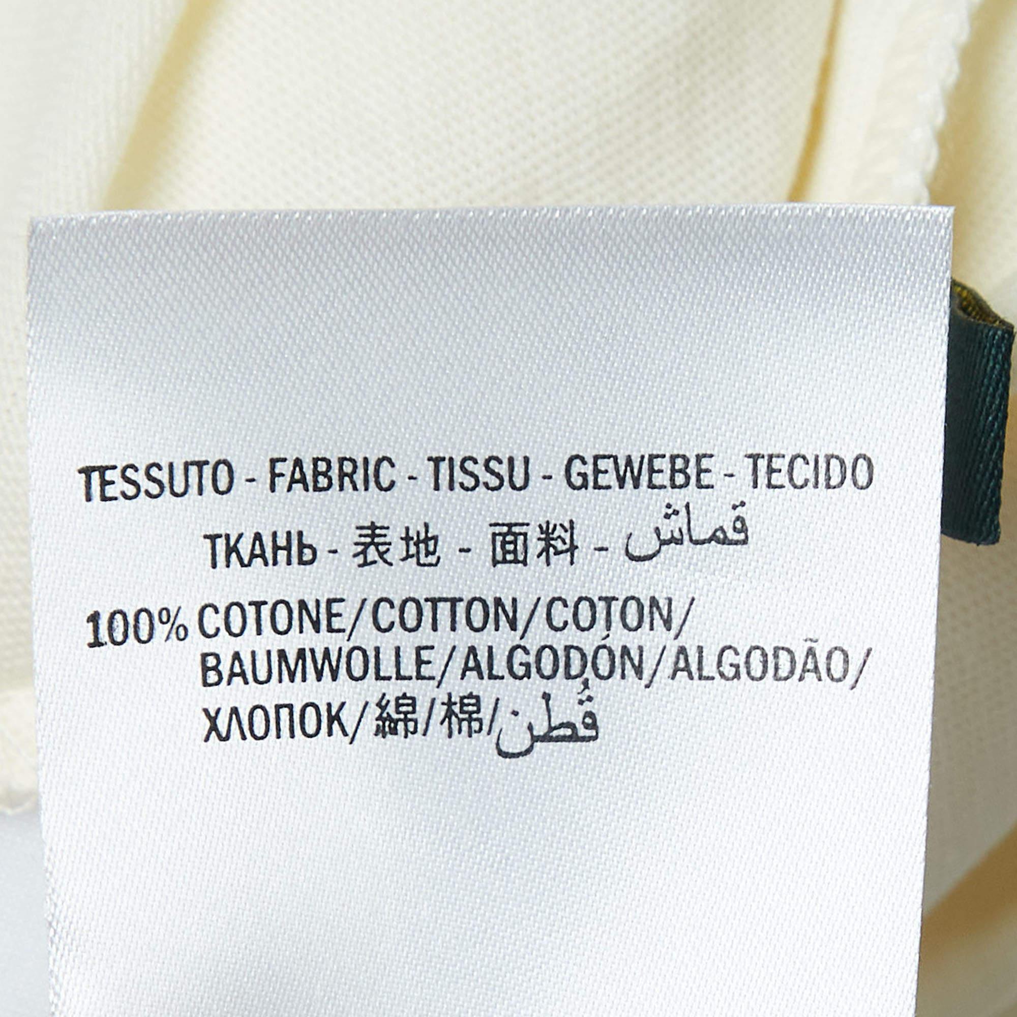 Dieses Gucci X Dan Dapper Tanktop lässt sich leicht mit Röcken, Jeans oder maßgeschneiderten Hosen kombinieren und sorgt für vielseitige Stylingmöglichkeiten. Es ist aus Baumwolle gefertigt, hat einen Rundhalsausschnitt und einen Logodruck auf der