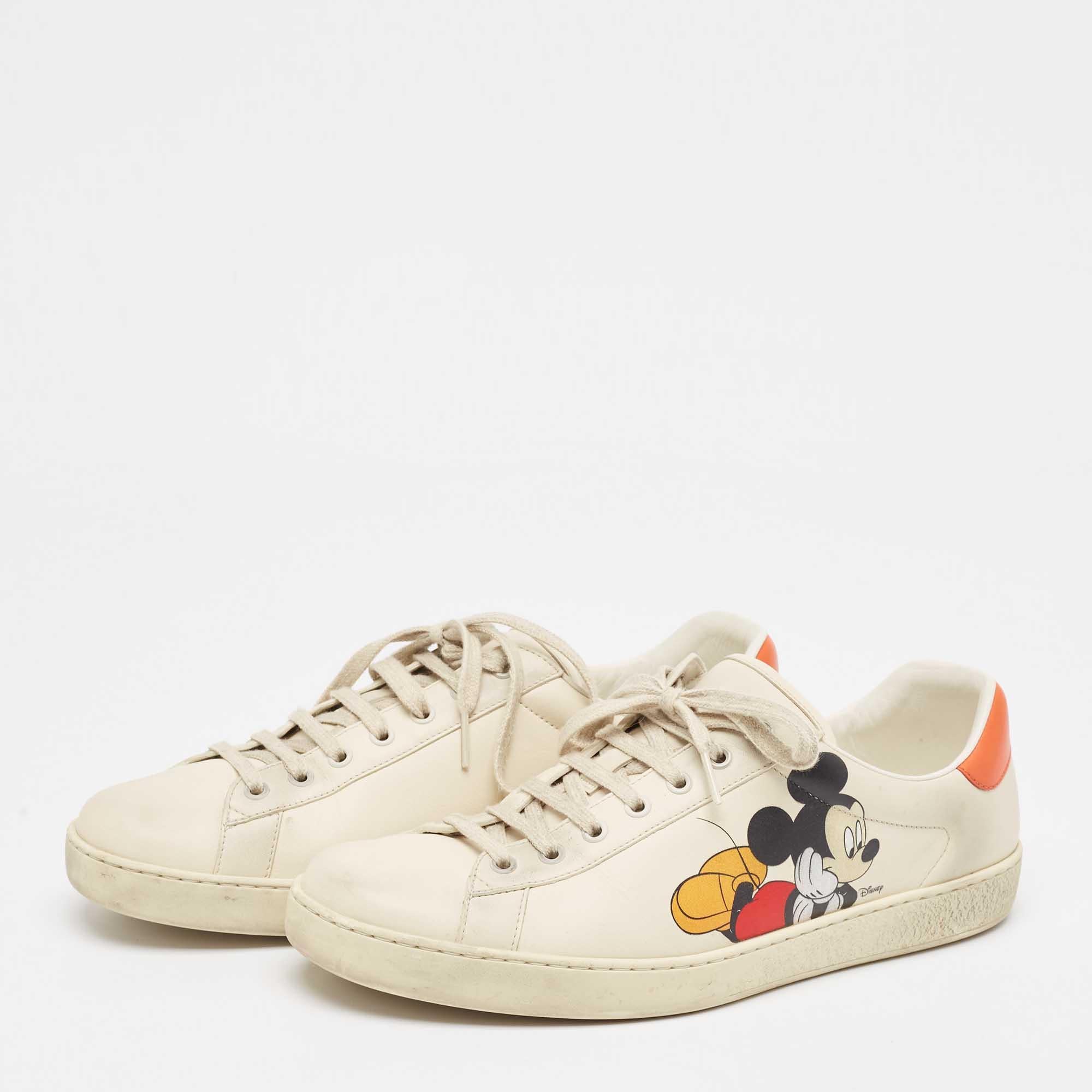 Step into fashion forward luxury with these Gucci x Disney sneakers. These premium kicks offer a harmonious blend of style and comfort perfect for those who demand sophistication in every step.